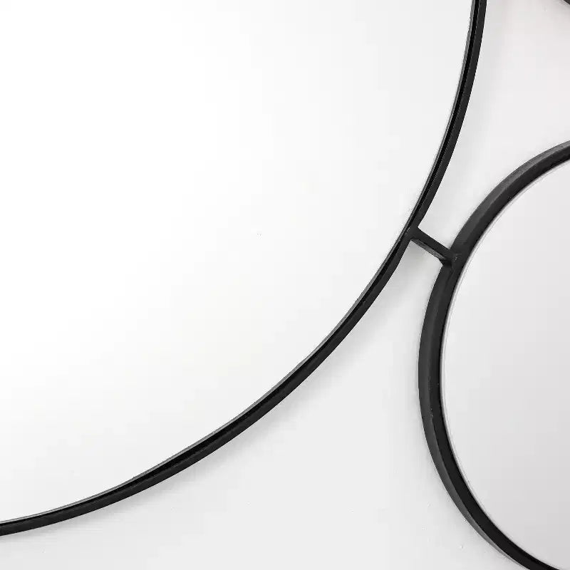 LuxenHome Round Wall Mirror, 34.5L x 24.5W Circles Black Metal Frame Modern Decorative Wall Mirror